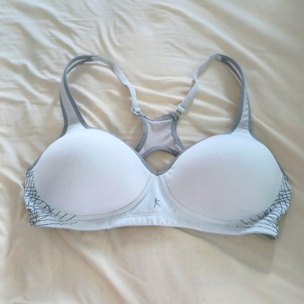 Sports Danskin Now bra 40C in light gray color. Criss cross in back. Hardly worn